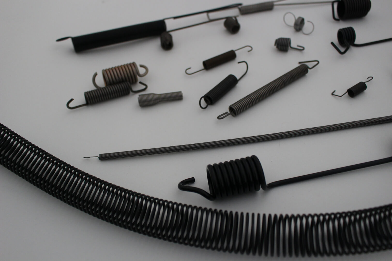 Extension springs of all sizes and types made by Timac Spring Manufacturing, Inc. - Xenia, OH